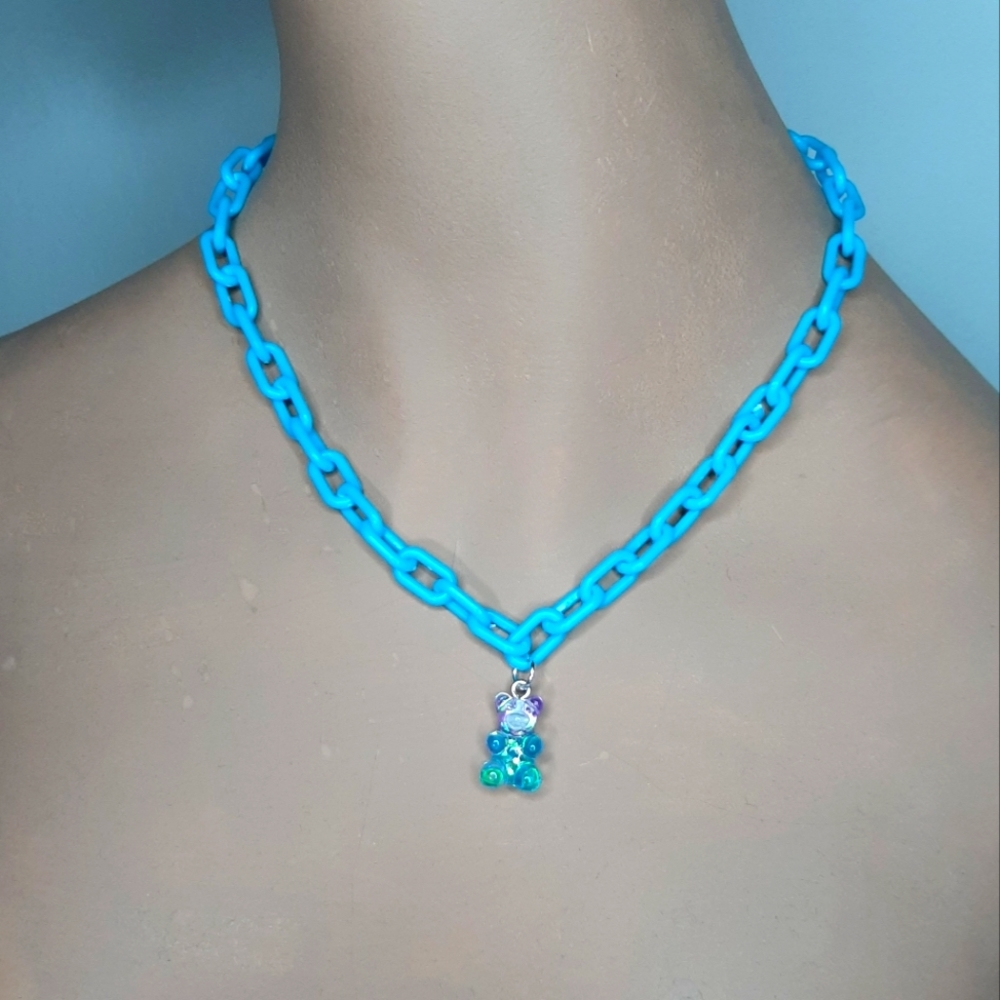 Plastic Blue Link Necklace with Blue & Purple Gillter Gummybear Pendant.